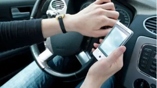 Написання SMS за кермом обійдеться в 16 000 гривень