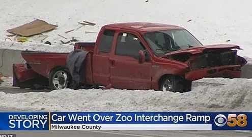 An impressive moment of a pickup truck falling from an overpass was captured on video