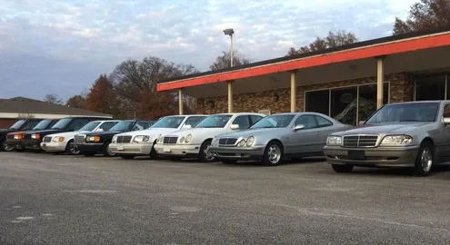 An abandoned car dealership with dozens of cars has been discovered