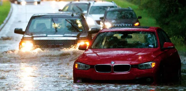 What is engine hydrostatic lock and how to avoid it during flooding