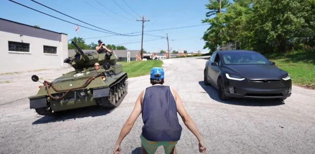 Electric crossover Tesla Model X challenged a tank (video)