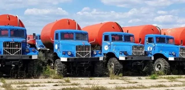 The photo showed a parking lot with dozens of abandoned KrAZ trucks