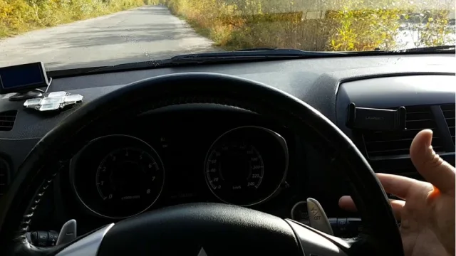 How to turn on the windshield washer?