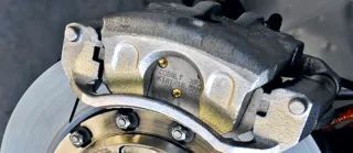 What is a brake caliper on a car?