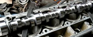 Where is the camshaft located in a car?