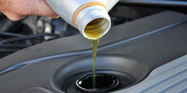 Where to pour engine oil into a car?