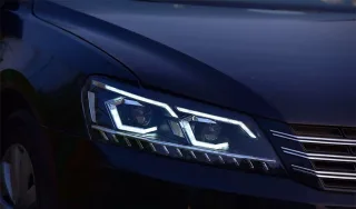 What is a car leaf spring and what does it look like?
