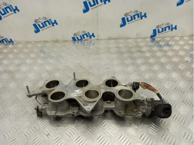 How to clean the intake manifold from carbon deposits on a diesel engine without removing it?