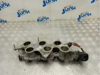 How to clean the intake manifold from carbon deposits on a diesel engine without removing it?