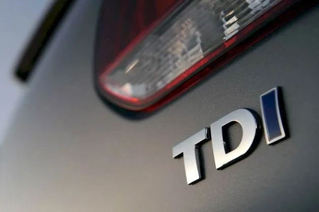 635790061201842868-654209690_volkswagen-golf-tdi-badge.imgopt1000x70.jpg