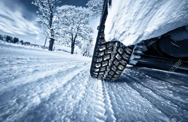 car-tires-on-winter-road-1024x667.jpg