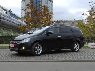 Black diamond. We ride a stylish minivan Mitsubishi Grandis