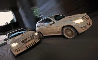 Princes in the mud. Audi Q5 and Mercedes GLK sort things out