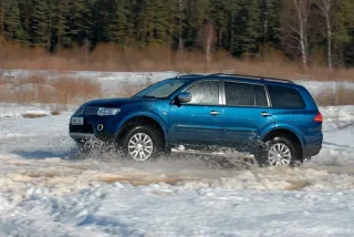 Jeep Cherokee or Mitsubishi Pajero Sport