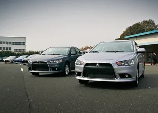 Silence. We are listening to the report on the update of the Mitsubishi Lancer sedan