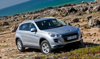 Peugeot Рубим сплеча этнические корни кроссовера Peugeot 4008