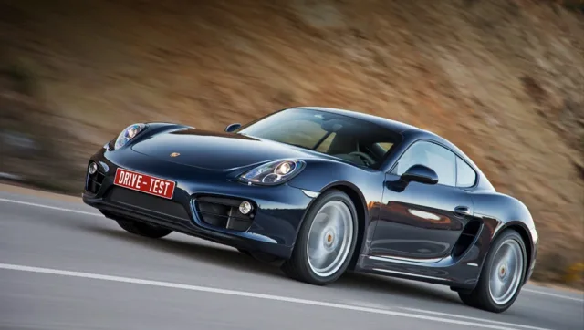 Вкручуємо в португальські повороти новий Porsche Cayman S