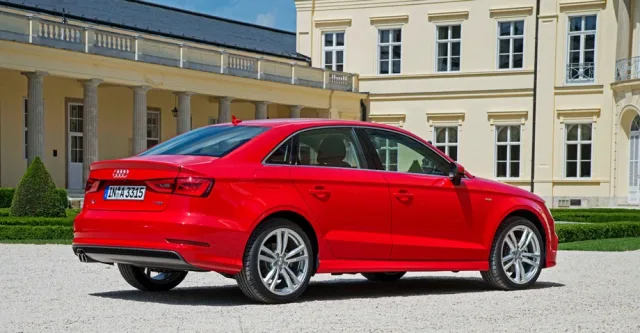 We go around the three-box Audi A3 Limousine from the rear