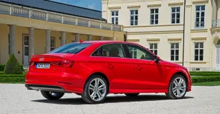 We go around the three-box Audi A3 Limousine from the rear