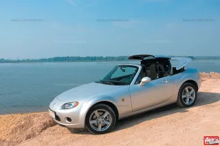 Windy. Ford Focus Coupe-Cabriolet, Opel Astra TwinTop, Volkswagen Eos and Volvo C70