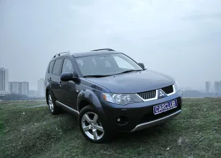 Mitsubishi Outlander XL: Паркетный проходимец