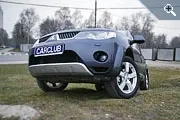 Mitsubishi Outlander XL: Паркетный проходимец