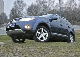 Mitsubishi Outlander XL: Паркетный проходимец