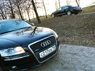Audi A8 and Mercedes-Benz S500L.