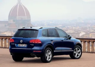 Три машини і гібрид. Яким має і не має бути новий Volkswagen Touareg