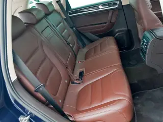 Три машини і гібрид. Яким має і не має бути новий Volkswagen Touareg