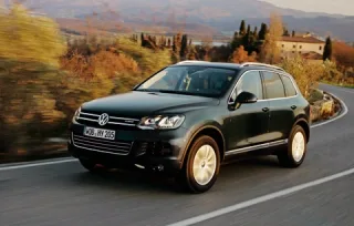Три машини і гібрид. Яким має і не має бути новий Volkswagen Touareg