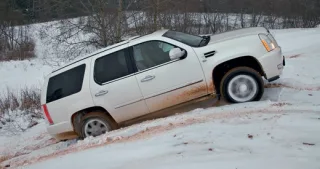 Audi Q7 против Cadillac Escalade