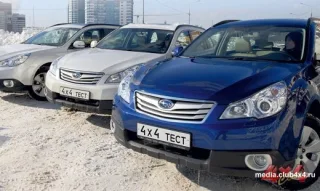 Three Subaru Legacy Outback