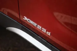 Тест-драйв BMW X1: война полов
