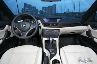 Тест-драйв BMW X1: война полов