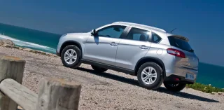 Peugeot Рубим сплеча этнические корни кроссовера Peugeot 4008