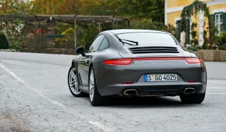 Приводимо осі Porsche 911 Carrera 4 та кросовера Cayenne S diesel