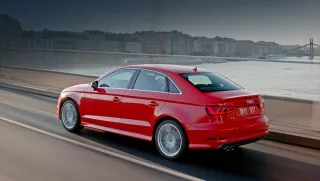 We go around the three-box Audi A3 Limousine from the rear