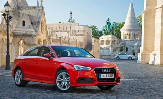 We go around the three-box Audi A3 Limousine from the rear