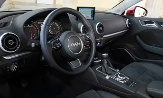 We go around the three-box Audi A3 Limousine from the rear