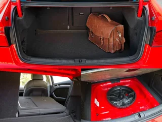 We go around the three-box Audi A3 Limousine from the rear