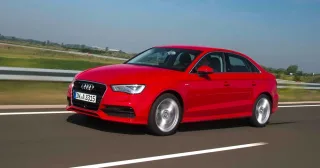 We go around the three-box Audi A3 Limousine from the rear