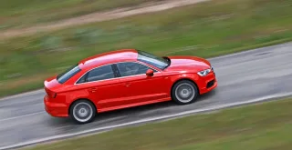 We go around the three-box Audi A3 Limousine from the rear