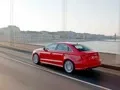 We go around the three-box Audi A3 Limousine from the rear