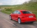We go around the three-box Audi A3 Limousine from the rear