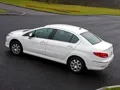 Дивимось на седан Peugeot 408 під різними кутами