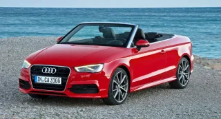 Chasing the Audi S3 sedan in a two-door Audi A3 Cabriolet
