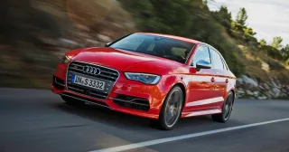 Chasing the Audi S3 sedan in a two-door Audi A3 Cabriolet