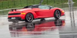 We're driving around Moscow Raceway in the Lamborghini Aventador and Gallardo coupes