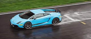 We're driving around Moscow Raceway in the Lamborghini Aventador and Gallardo coupes